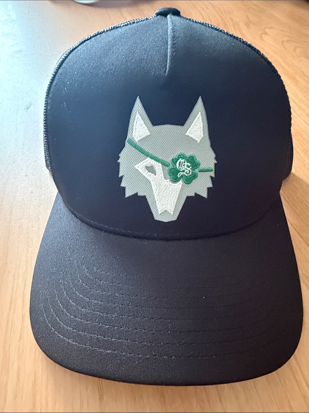 Black Trucker Hat with Wolf Patch and Green Accent